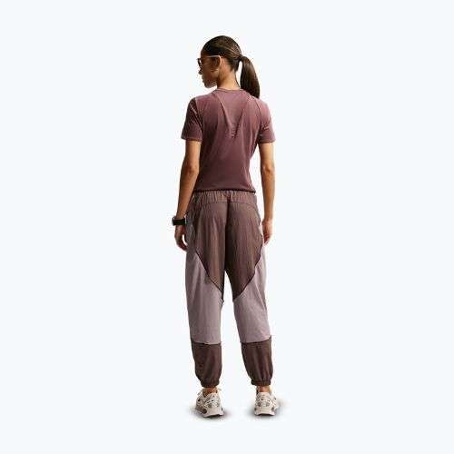 Spodnie do biegania damskie Nike Swift UV Repel Mid-Rise tattoo/light violet ore
