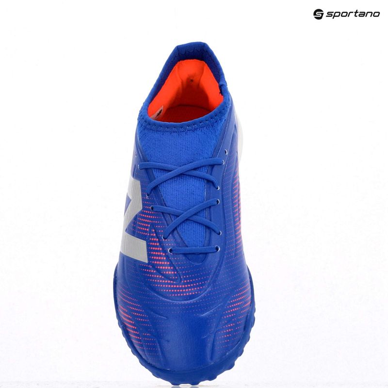 Buty do piłki nożnej dziecięce New Balance Tekela Team Low JR TF blue 9