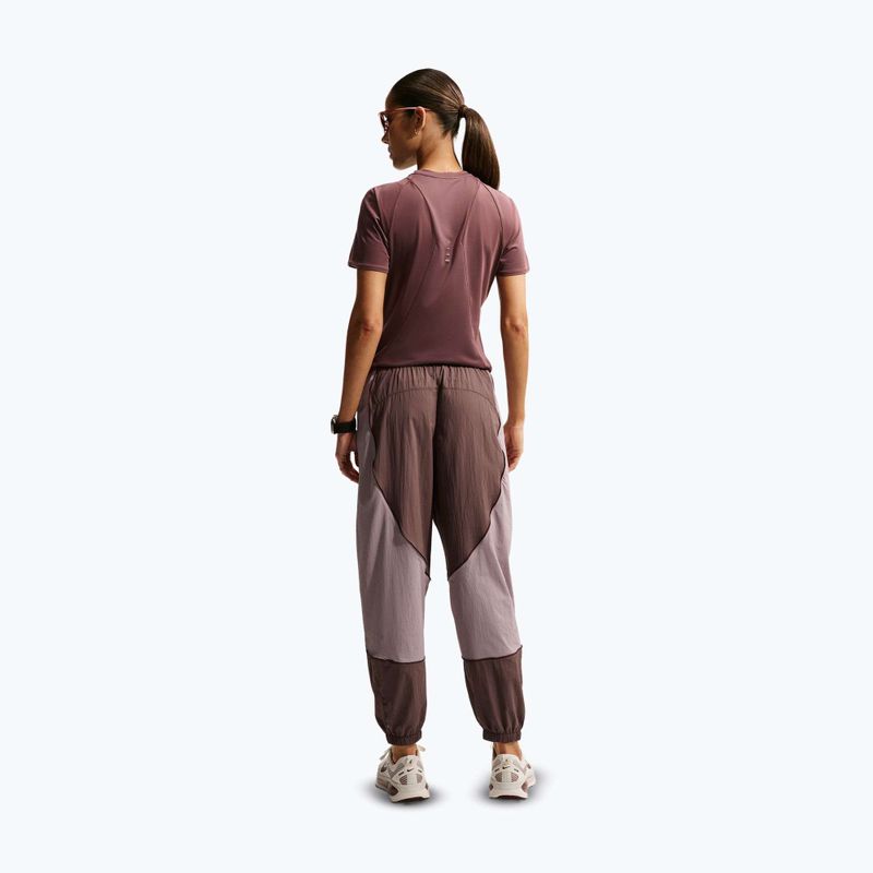 Spodnie do biegania damskie Nike Swift UV Repel Mid-Rise tattoo/light violet ore 3
